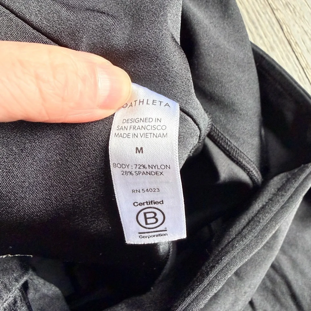 Athleta Elation Shine Tight in Black Size Medium - Picture 2 of 5